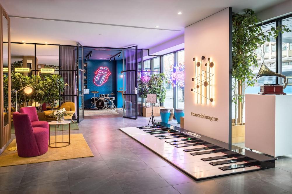 Barcelo Imagine Hotel Madrid Exterior photo The Rolling Stones' logo on the wall of the hotel
